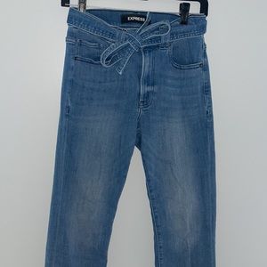 Express flare jeans with a accent tie around the waste